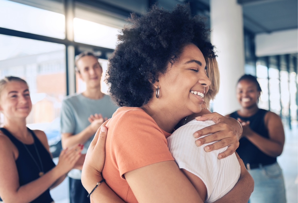 Photo of women hugging